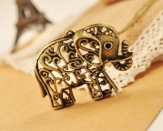 DGI MART Antique Hollow Carved Cute Elephant Pendant with Long Chain Necklace